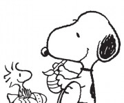 Coloriage et dessins gratuit Snoopy décore les Oeufs à imprimer